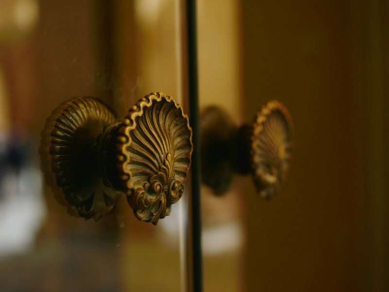 Ornate brass door handles